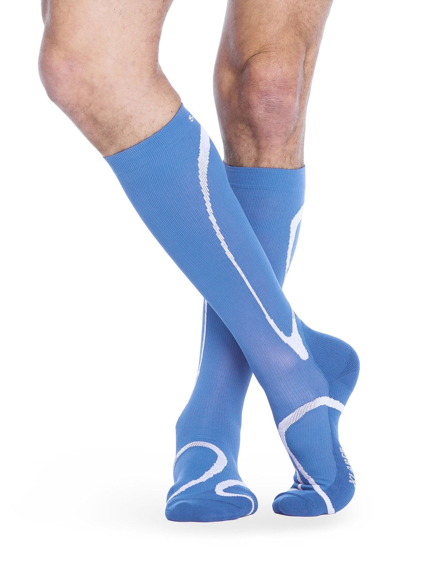 Legs of male model wearing Sigvaris High Tech compression calf socks in steel blue.