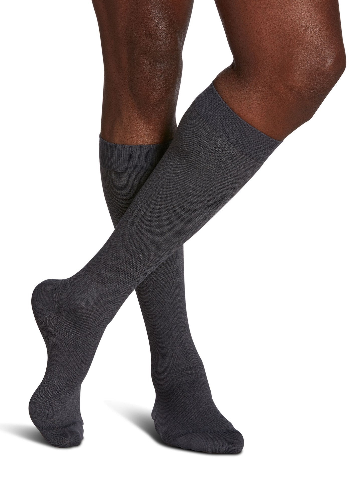 Legs of male model in Sigvaris Microfiber Patterns compression socks in graphite heather.