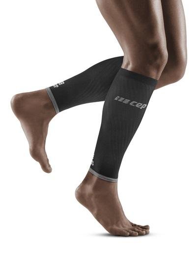 Lower legs of model in CEP Ultralight compression calf sleeves in black.