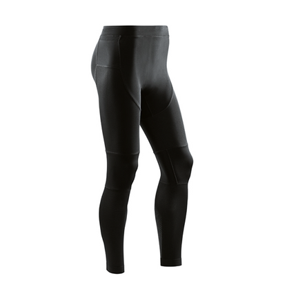 Lower body of model in CEP Run compression tights in black.