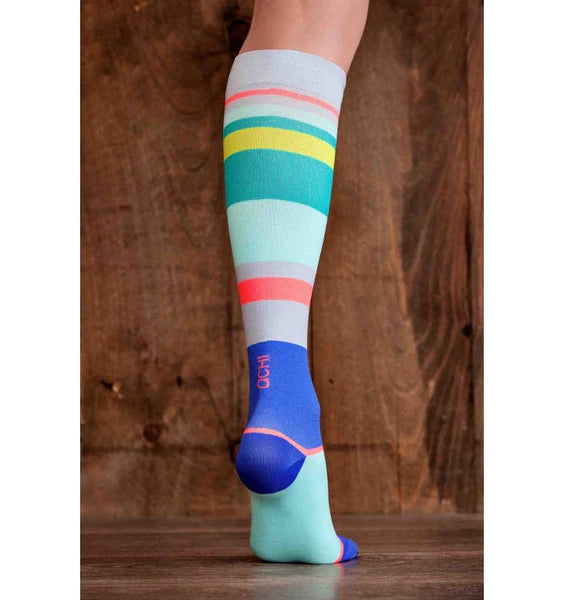 Single leg of female model in Lunatik Urbane Stripe compression sock.